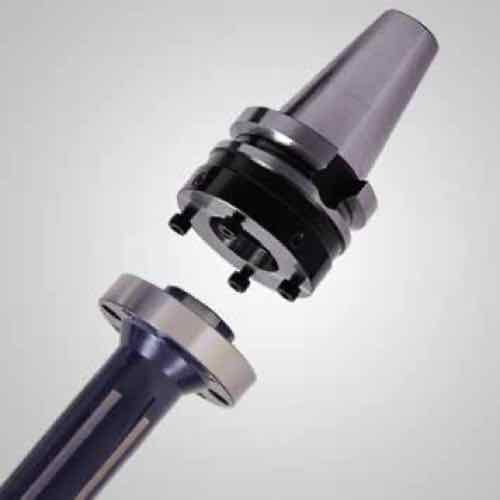 An exploded view of a BT-taper adaptor and shell-mill arbor assembly