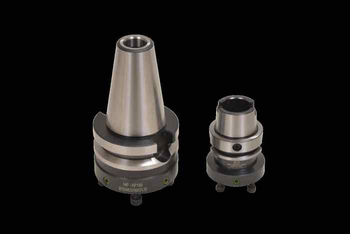A pair of Mac Precitec India modular tool holding adaptors used to configure custom cutting head setups