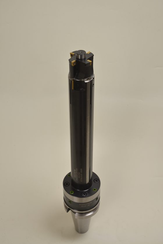 Flanged boring tool with carbide insert visible