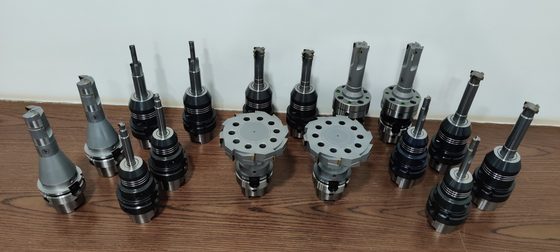 Assorted tool holders and cutters, laid out for review