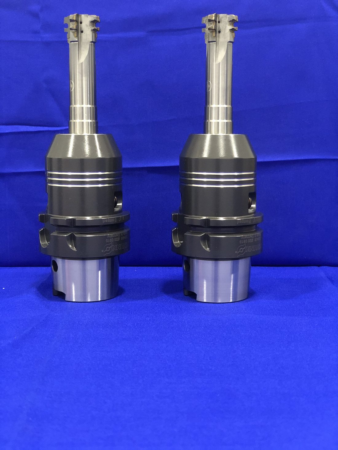 Two face-milling heads, compared