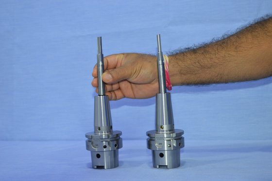 Two tool holders held up for comparison