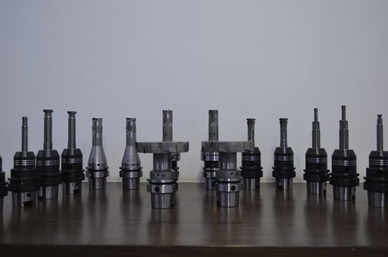 Row of tool holders and cutters