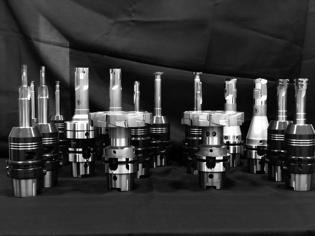 Range of tool holders and cutters, on display