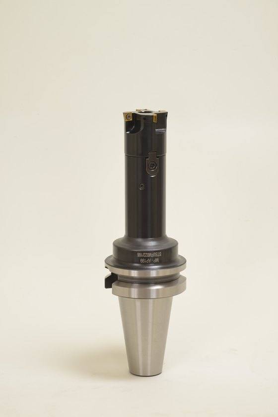 An adjustable boring/facing head built for large bore power generation components