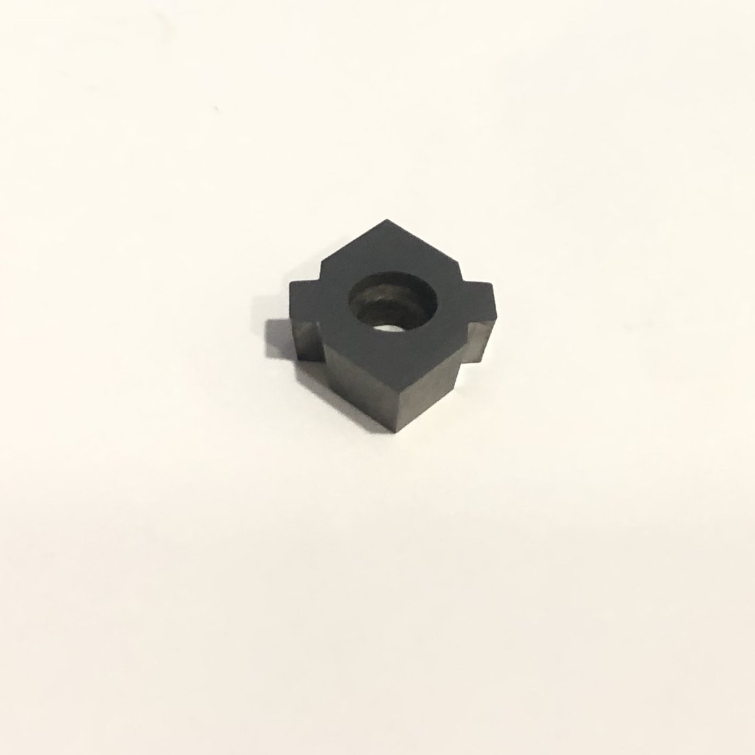 Hexagonal insert with a center mounting hole, alternate angle