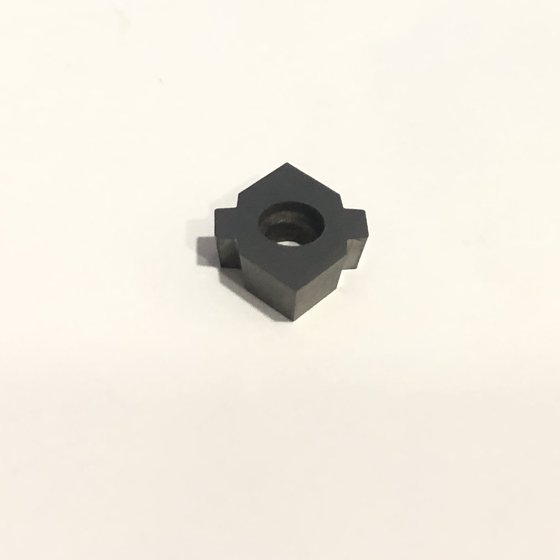 Hexagonal insert with a center mounting hole, alternate angle